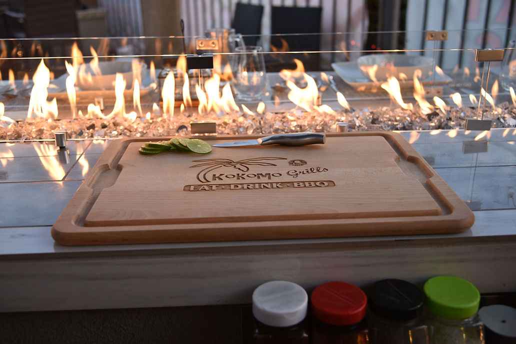 KoKoMo Bermuda Kitchen BBQ Island with Built-In TV, Fire Pit & Bar for Ultimate Outdoor Entertaining - The Vitality Estate